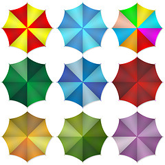 Image showing Multi colored beach umbrellas. 