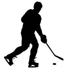 Image showing silhouette of hockey player. Isolated on white. 