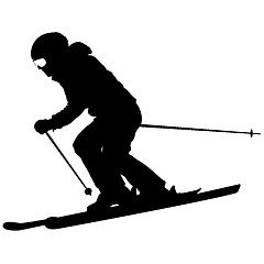 Image showing Mountain skier  speeding down slope. sport silhouette.