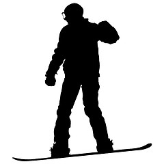 Image showing Black silhouettes  snowboarders on white background. 