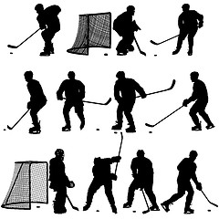 Image showing Set of silhouettes of hockey player. Isolated on white. 