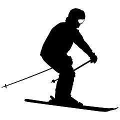 Image showing Mountain skier  speeding down slope. sport silhouette.