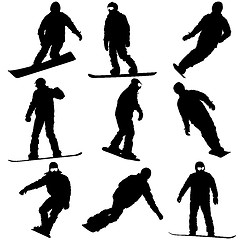 Image showing Black silhouettes set snowboarders on white background. 