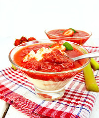 Image showing Dessert strawberry-vanilla and rhubarb in two glassful on napkin