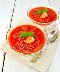 Image showing Dessert strawberry-vanilla in two glassful with spoon on board