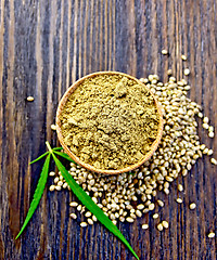 Image showing Flour hemp in spoon with leaf on board