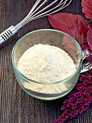 Image showing Flour amaranth in glass cup on board with mixer