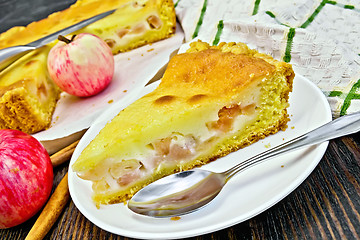 Image showing Pie apple with sour cream and cinnamon on board