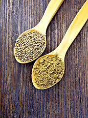 Image showing Flour and seed of hemp in spoon on board top
