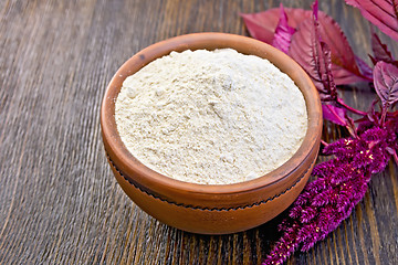 Image showing Flour amaranth in clay bowl on board