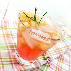 Image showing Lemonade with rhubarb and rosemary on pink napkin