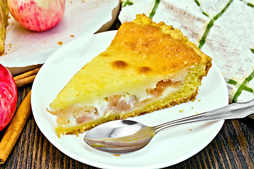 Image showing Pie apple with sour cream on dark board