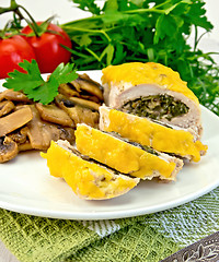 Image showing Roll chicken with champignons on napkin