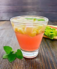 Image showing Lemonade with rhubarb and mint on dark board