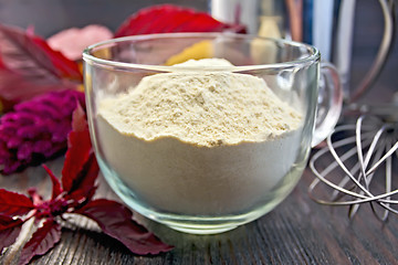 Image showing Flour amaranth in glass cup on board