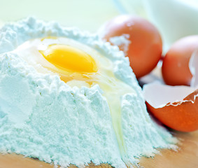 Image showing flour and raw eggs