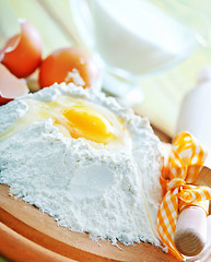 Image showing flour and raw eggs