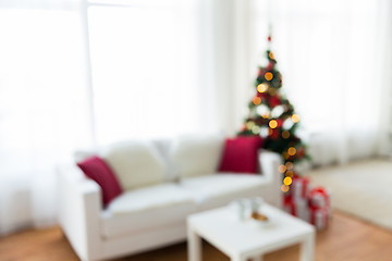 Image showing blurred living room with christmas tree background