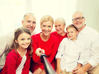 Image showing smiling family making selfie at home