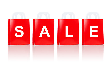 Image showing many red shopping bags with sale word