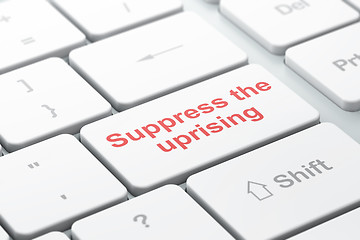 Image showing Political concept: Suppress The Uprising on computer keyboard background