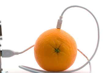Image showing The orange connected through usb cable