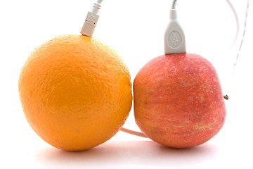 Image showing The orange and apple are connected through a cable 2