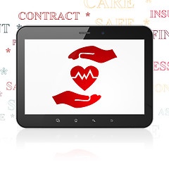 Image showing Insurance concept: Tablet Computer with Heart And Palm on display
