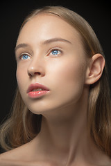 Image showing Beautiful face of young woman with clean fresh skin close up
