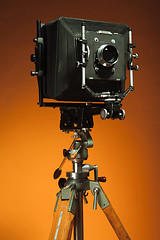 Image showing Vintage retro camera on a tripod