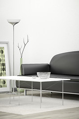 Image showing black sofa in a white room