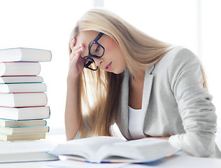 Image showing student with books and notes