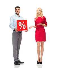 Image showing happy couple with red sale sign