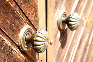 Image showing stripped paint  door    in italy    nail