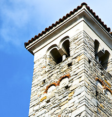 Image showing in varano borghi  old abstract    wall  and church tower bell su