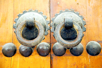 Image showing brown  morocco in   facade home and rusty safe padlock 