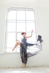 Image showing The beautiful ballerina posing in long gray dress 