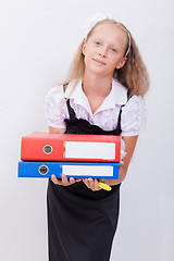 Image showing Schoolgirl with folders 