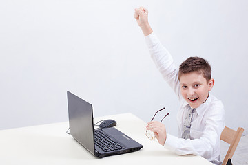 Image showing Boy using his laptop computer