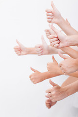 Image showing hands of teenagers showing okay sign on white 