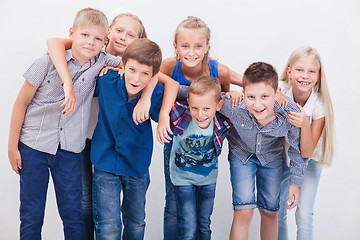 Image showing The smiling teenagers on white 