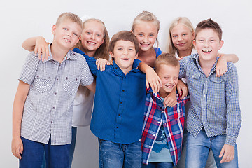 Image showing The smiling teenagers on white 