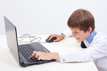 Image showing Boy using his laptop computer