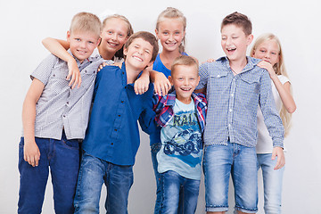 Image showing The smiling teenagers on white 