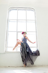 Image showing The beautiful ballerina posing in long gray dress 