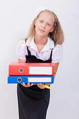 Image showing Schoolgirl with folders 