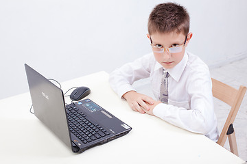 Image showing Boy using his laptop computer