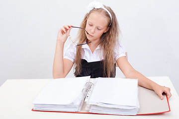 Image showing Schoolgirl with folders 