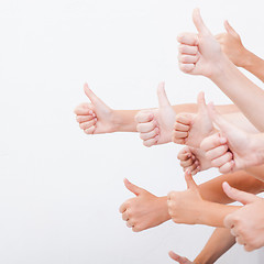 Image showing hands of teenagers showing okay sign on white 