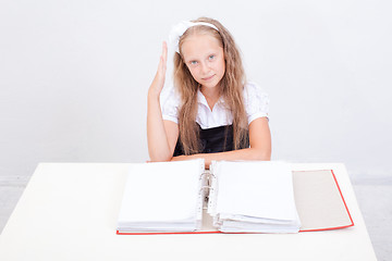 Image showing Schoolgirl with folders 
